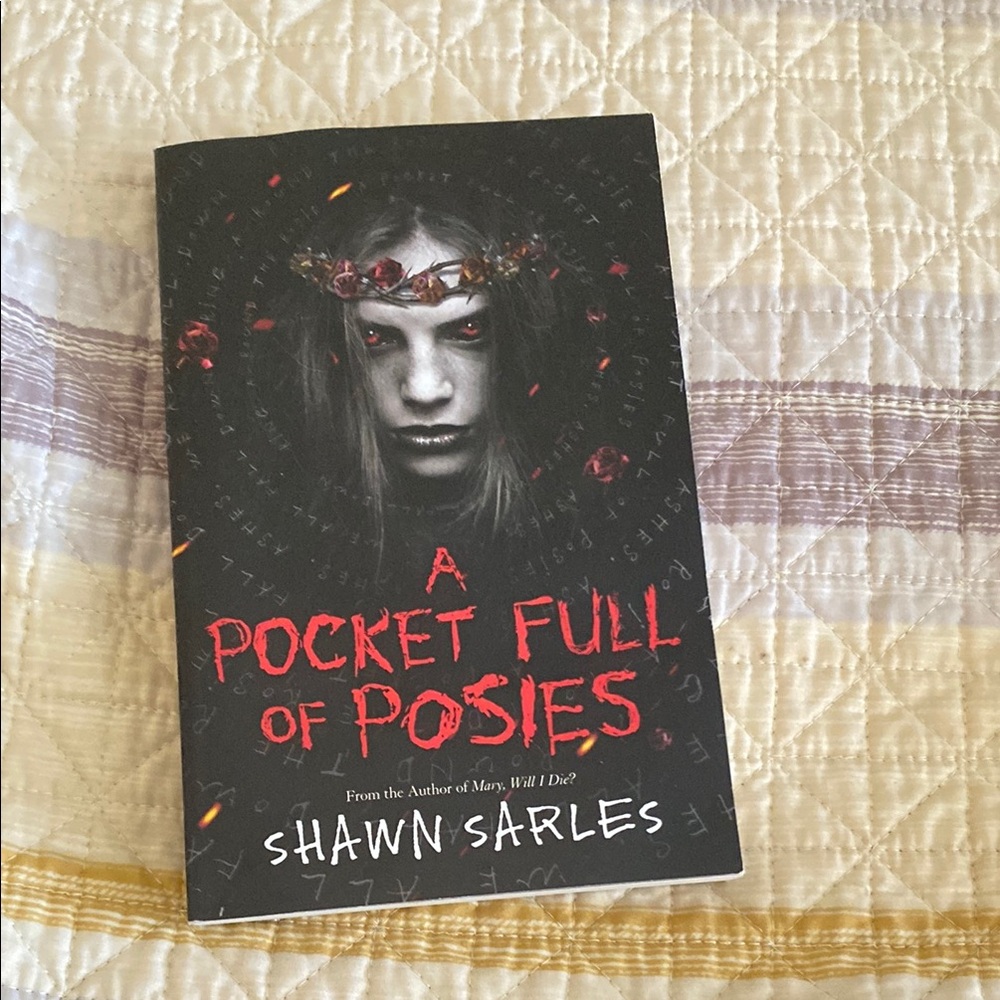 A Pocket Full of Posies by - Black and Red Cover